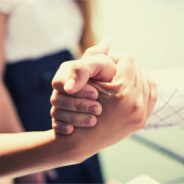 Health Justice Partnership Thumbnail - hands grasping each other
