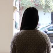 Woman with black hair in silhouette