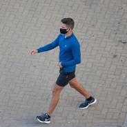 Mans wears COVID mask outside