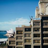 Sirius building with the Opera House in the background. A hand painted sign in the window reads "Not for Sale"