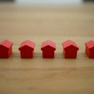 5 toy houses lined up